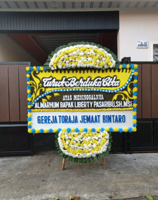Papan Bunga Duka di Sukakarya